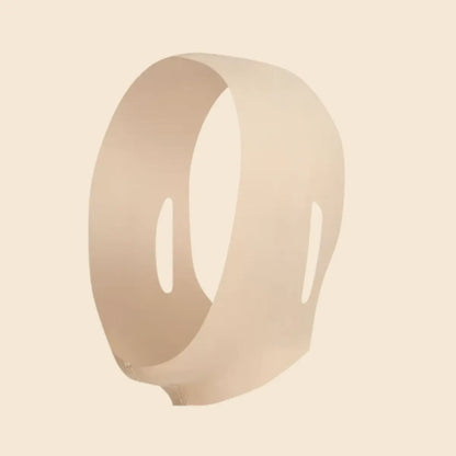 Le masque qui sculpte le visage et la mâchoire.