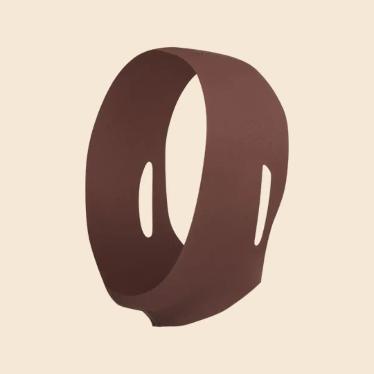 Le masque qui sculpte le visage et la mâchoire.